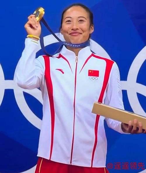 奥运会网球郑钦文女单夺冠 中国时隔20年再摘金